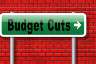 Budget cuts reduce costs and cut spendings during crisis or economic recession